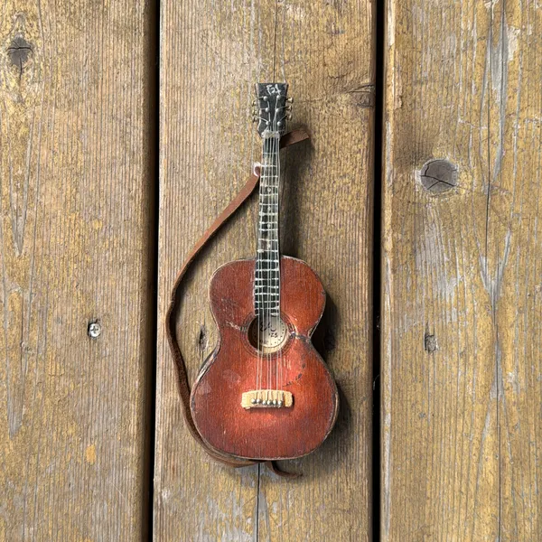 image of Tiny Guitar (approx 9”x4”)