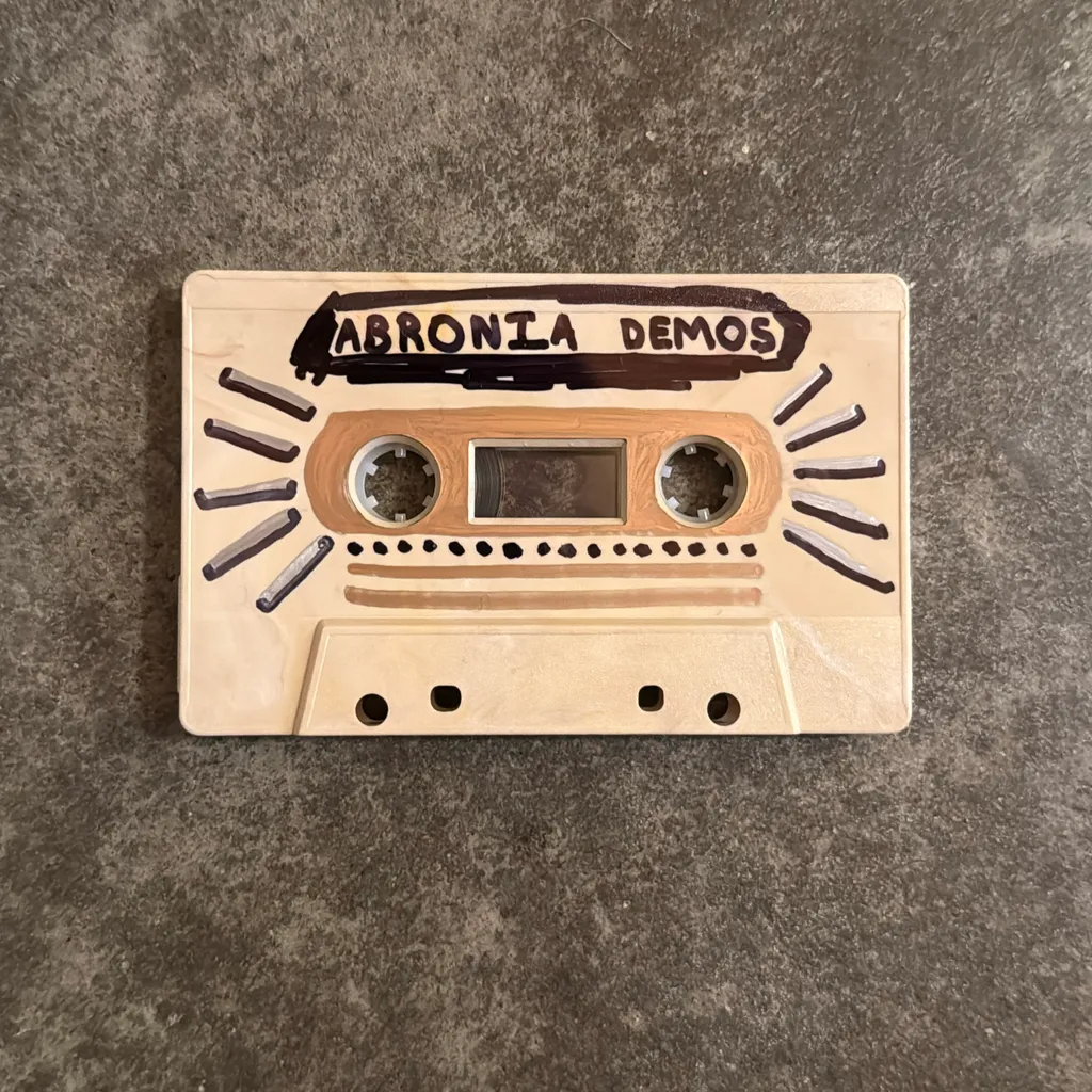 image of 2 song cassette of Unreleased Abronia Demos for the record “Shapes Unravel”