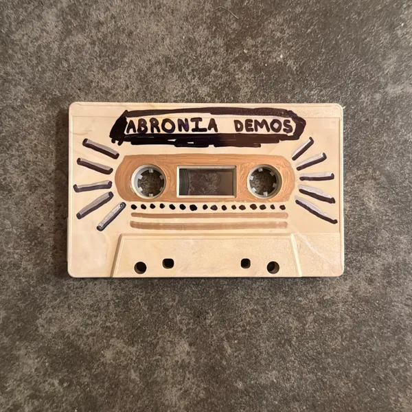 image of 2 song cassette of Unreleased Abronia Demos for the record “Shapes Unravel”