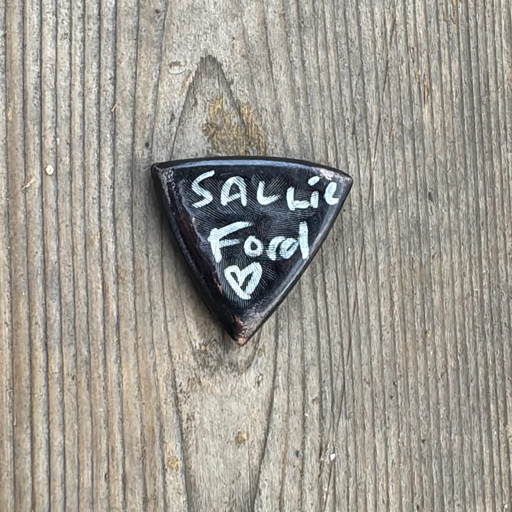 image of Handmade Signed Leather Guitar Pick