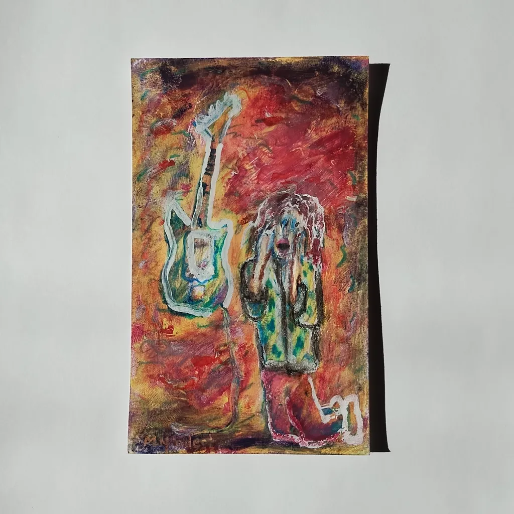 image of Man Screaming at Guitar